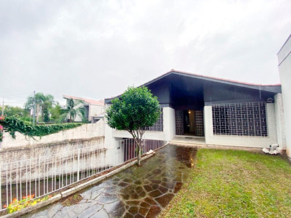 Imagem Casa com 3 Quartos à Venda, 340 m² em Três Figueiras - Porto Alegre
