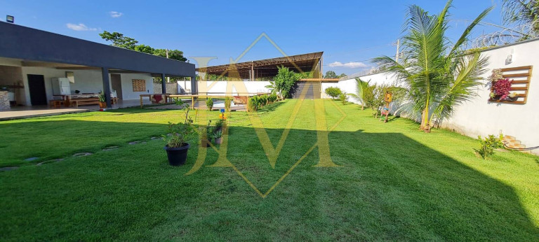 Imagem Chácara com 4 Quartos à Venda, 1.500 m² em Caratinga