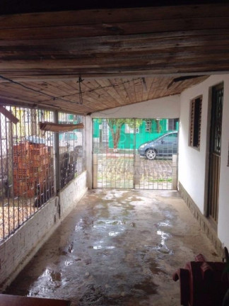 Imagem Casa com 3 Quartos à Venda, 130 m² em Vila Nova - Porto Alegre
