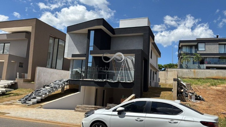 Imagem Casa de Condomínio com 4 Quartos à Venda, 452 m² em Alphaville - Vespasiano