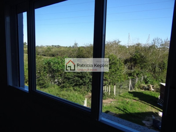 Imagem Sobrado com 3 Quartos à Venda, 111 m² em Mário Quintana - Porto Alegre