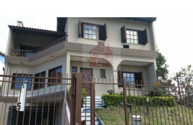 Imagem Casa com 4 Quartos à Venda, 460 m² em Cristal - Porto Alegre Imagem Casa com 4 Quartos à Venda, 460 m² em Cristal - Porto Alegre