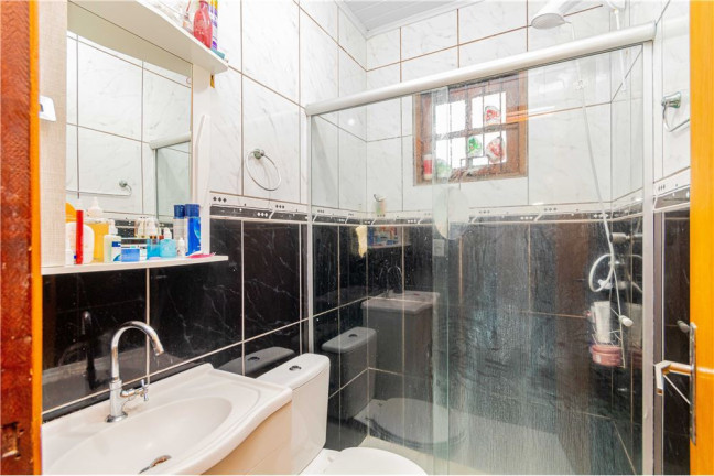 Imagem Casa com 4 Quartos à Venda,  em Sarandi - Porto Alegre