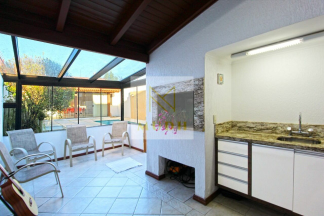 Imagem Casa com 4 Quartos à Venda, 300 m² em Ipanema - Porto Alegre