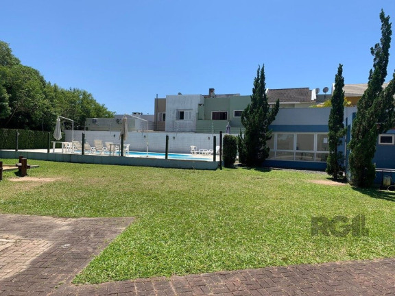 Imagem Casa com 3 Quartos à Venda, em Hípica - Porto Alegre Imagem Casa com 3 Quartos à Venda, em Hípica - Porto Alegre