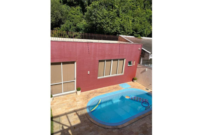 Imagem Casa com 4 Quartos à Venda, 330 m² em Nonoai - Porto Alegre