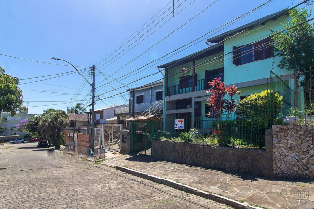 Imagem Casa com 3 Quartos à Venda, 216 m² em Vila Nova - Porto Alegre