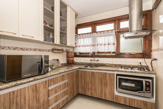 Imagem Apartamento com 3 Quartos à Venda, 107 m² em Menino Deus - Porto Alegre