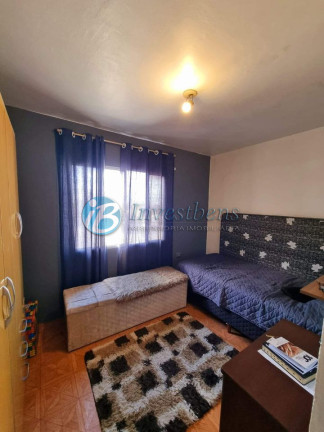 Imagem Casa com 4 Quartos à Venda, 190 m² em Novo Mundo - Curitiba