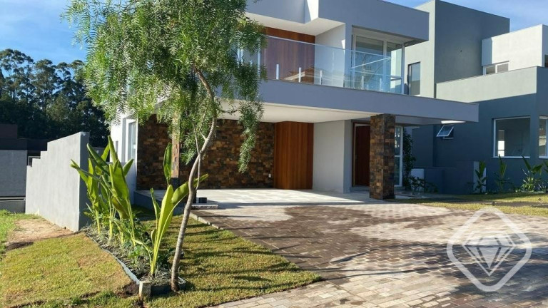 Imagem Casa de Condomínio com 4 Quartos à Venda,  em Vila Nova - Porto Alegre
