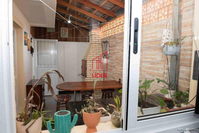Imagem Sobrado com 3 Quartos à Venda, 117 m² em Uberaba - Curitiba