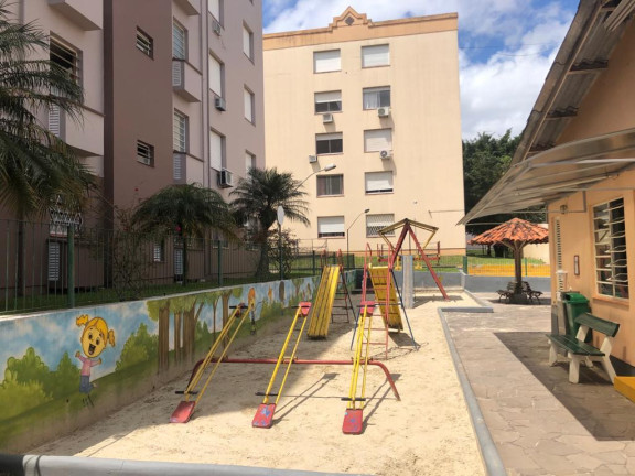 Imagem Apartamento com 2 Quartos à Venda, 63 m² em Protasio - Porto Alegre