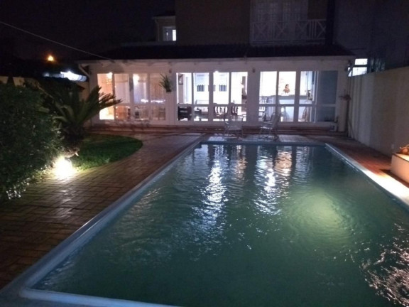 Imagem Casa com 4 Quartos à Venda, 243 m² em Partenon - Porto Alegre