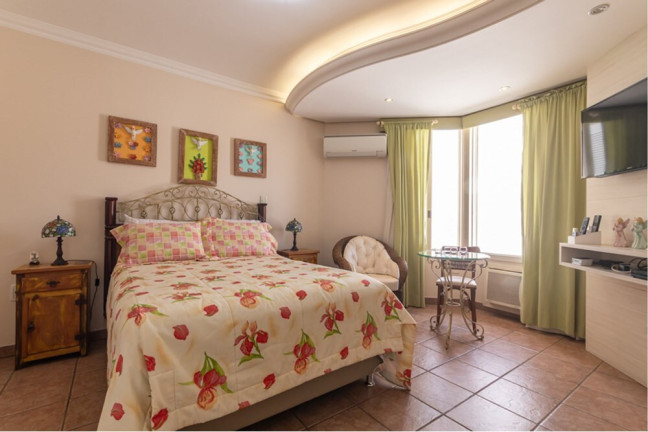 Imagem Casa de Condomínio com 4 Quartos à Venda, 898 m² em Boa Vista - Porto Alegre