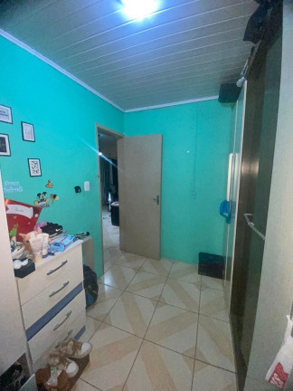 Imagem Casa com 2 Quartos à Venda,  em Costa E Silva - Porto Alegre