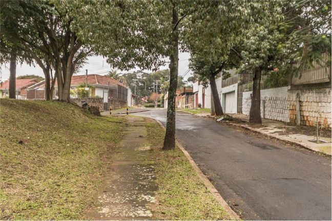 Imagem Casa com 4 Quartos à Venda, 201 m² em Santa Tereza - Porto Alegre