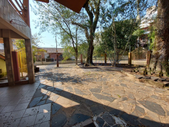 Imagem Sobrado com 5 Quartos à Venda, 380 m² em Jardim Lindóia - Porto Alegre