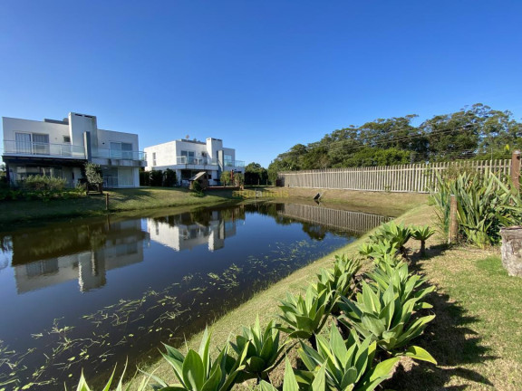 Imagem Casa com 3 Quartos à Venda, 152 m² em Condominio One Atlantida Houses - Xangri-lá Imagem Casa com 3 Quartos à Venda, 152 m² em Condominio One Atlantida Houses - Xangri-lá