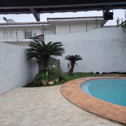 Imagem Casa com 4 Quartos à Venda, 247 m² em Jardim Virgínia - Guarujá