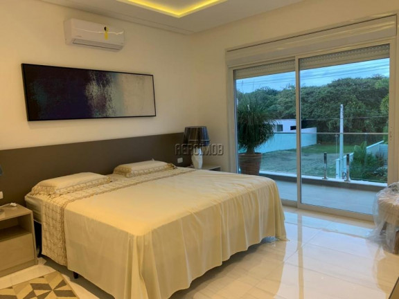 Imagem Casa com 7 Quartos à Venda, 607 m² em Riviera De São Lourenço - Bertioga