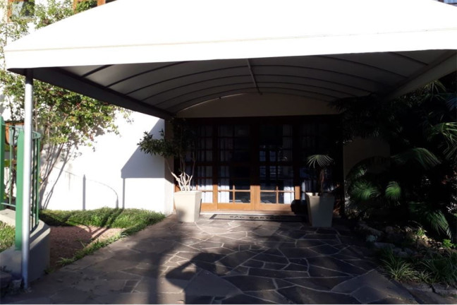 Imagem Casa de Condomínio com 4 Quartos à Venda, 195 m² em Teresópolis - Porto Alegre
