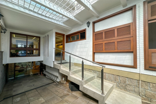 Imagem Casa com 3 Quartos à Venda, 300 m² em Três Figueiras - Porto Alegre