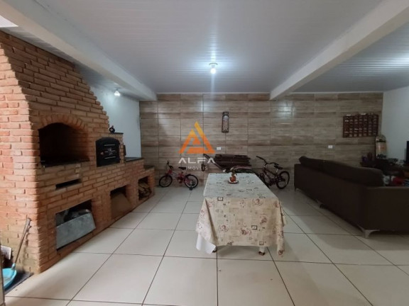 Imagem Casa com 4 Quartos à Venda, 240 m²