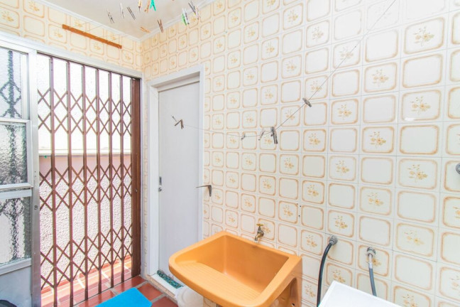 Imagem Casa com 3 Quartos à Venda, 338 m² em Jardim Sabará - Porto Alegre