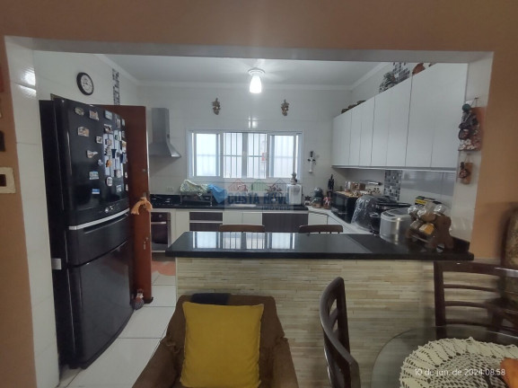 Imagem Casa com 2 Quartos à Venda, 90 m² em Guilhermina - Praia Grande
