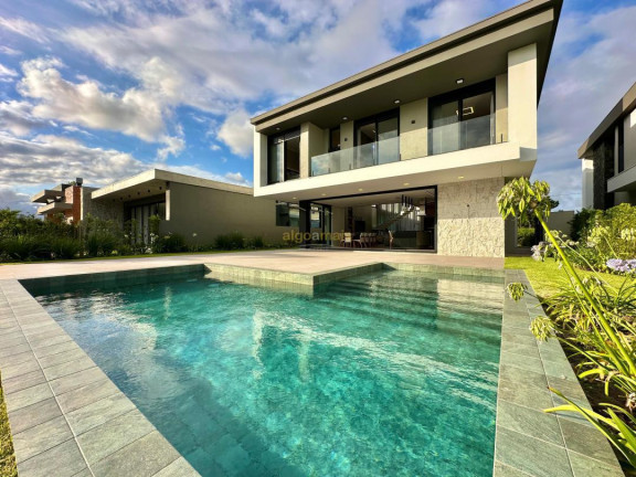 Imagem Casa com 5 Quartos à Venda, 402 m² em Condominio Capao Ilhas Resort - Capão Da Canoa Imagem Casa com 5 Quartos à Venda, 402 m² em Condominio Capao Ilhas Resort - Capão Da Canoa