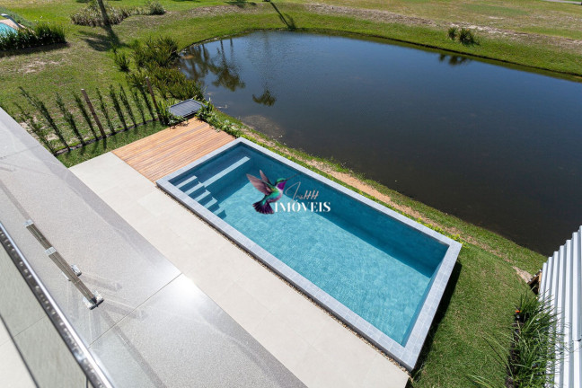 Imagem Casa de Condomínio com 4 Quartos à Venda, 359 m² em Centro - Torres