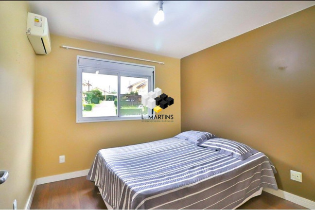 Imagem Casa de Condomínio com 3 Quartos à Venda, 230 m² em Mário Quintana - Porto Alegre