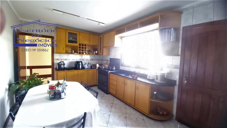 Imagem Casa com 4 Quartos à Venda, 260 m² em Vila Nova - Porto Alegre