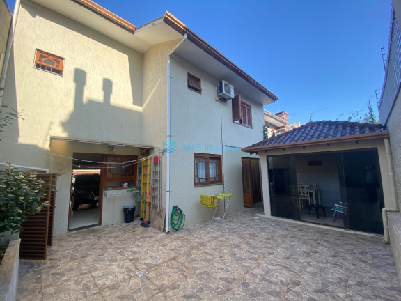 Imagem Sobrado com 3 Quartos à Venda, 185 m² em Moinhos De Vento - Canoas