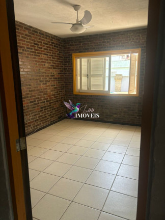 Imagem Casa com 3 Quartos à Venda, 126 m² em Centro - Torres