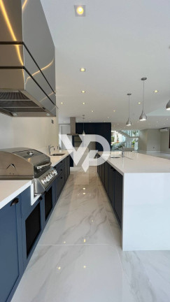 Imagem Casa de Condomínio com 4 Quartos à Venda, 558 m² em Alphaville - Barueri
