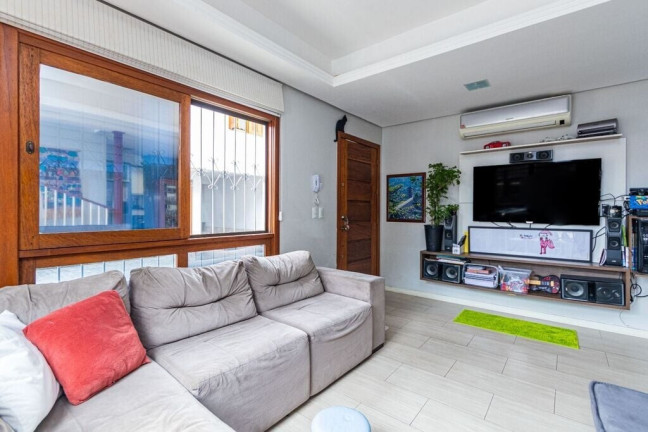 Imagem Casa de Condomínio com 3 Quartos à Venda, 168 m² em Santo Antônio - Porto Alegre