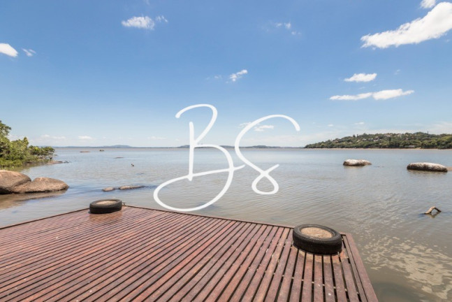 Imagem Casa com 4 Quartos à Venda, 470 m² em Pedra Redonda - Porto Alegre