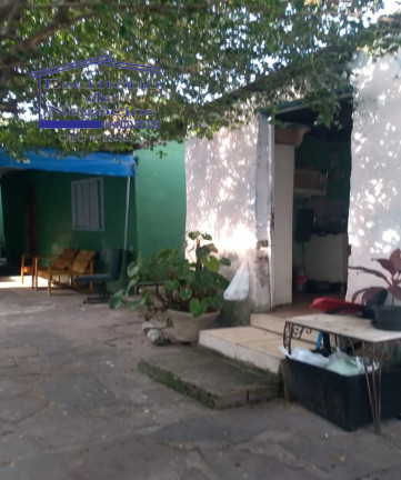 Imagem Casa com 6 Quartos à Venda, 150 m² em Cavalhada - Porto Alegre