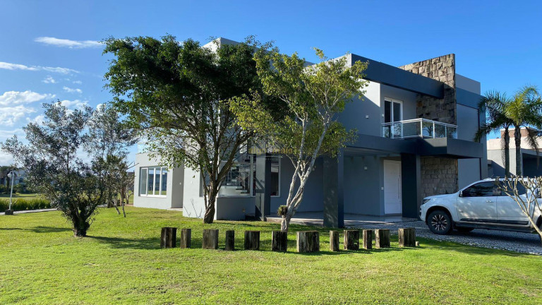 Imagem Casa com 4 Quartos à Venda, 359 m² em Condominio Riviera Xangri-la - Xangri-lá Imagem Casa com 4 Quartos à Venda, 359 m² em Condominio Riviera Xangri-la - Xangri-lá