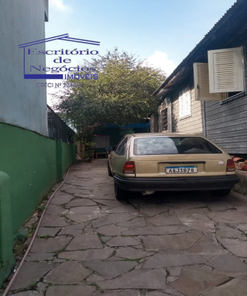 Imagem Casa com 6 Quartos à Venda, 150 m² em Cavalhada - Porto Alegre Imagem Casa com 6 Quartos à Venda, 150 m² em Cavalhada - Porto Alegre