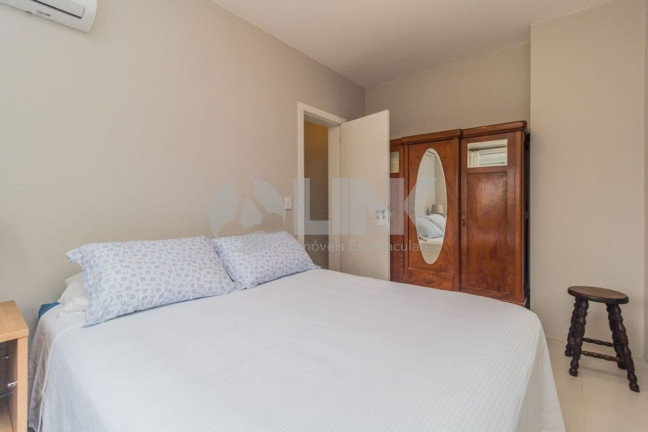 Imagem Apartamento com 1 Quarto à Venda, 35 m² em Santo Antônio - Porto Alegre Imagem Apartamento com 1 Quarto à Venda, 35 m² em Santo Antônio - Porto Alegre
