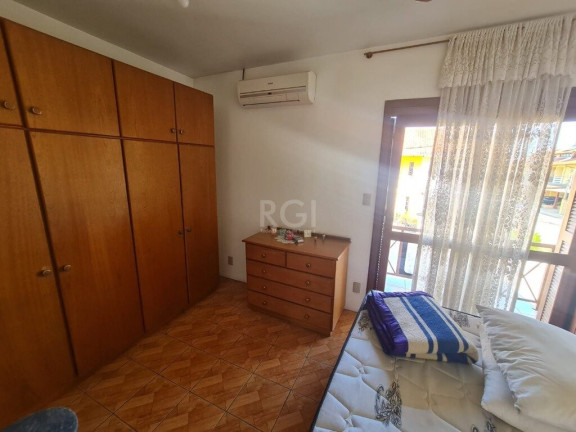 Imagem Casa de Condomínio com 2 Quartos à Venda, 72 m² em Hípica - Porto Alegre