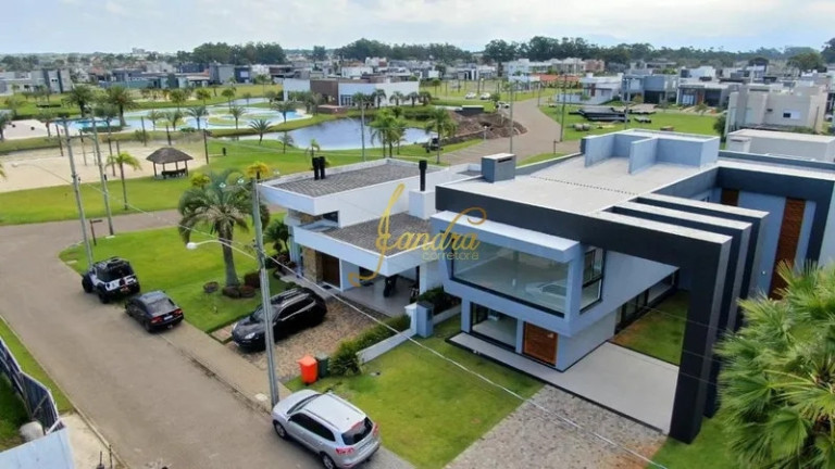 Imagem Casa de Condomínio com 5 Quartos à Venda, 310 m² em Zona Nova - Capão Da Canoa