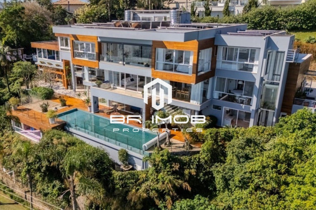 Imagem Casa com 6 Quartos à Venda, 1.093 m² em Cacupé - Florianópolis