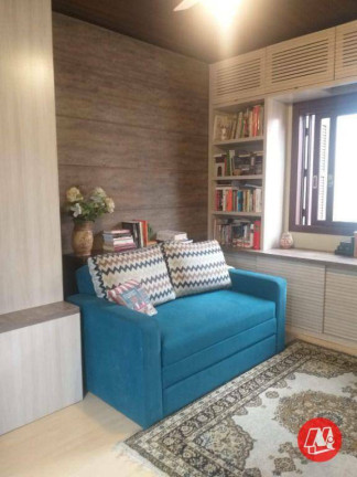 Imagem Sobrado com 4 Quartos à Venda, 280 m² em Rio Branco - Porto Alegre