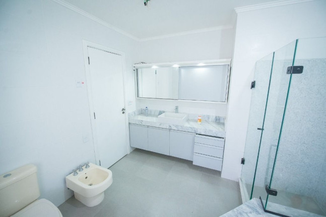 Imagem Casa com 4 Quartos à Venda, 272 m² em Rio Branco - Porto Alegre