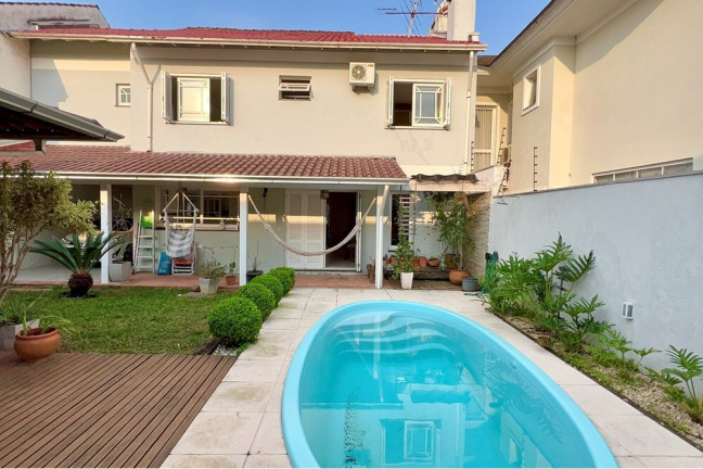 Imagem Casa com 4 Quartos à Venda, 243 m² em Moinhos De Vento - Canoas