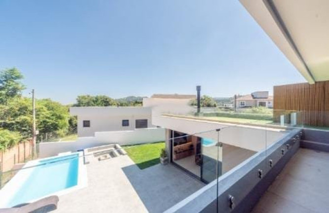 Imagem Casa com 5 Quartos à Venda, 340 m² em Vila Nova - Porto Alegre