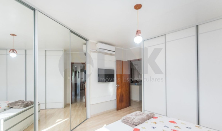 Imagem Sobrado com 3 Quartos à Venda, 316 m² em Jardim Lindóia - Porto Alegre